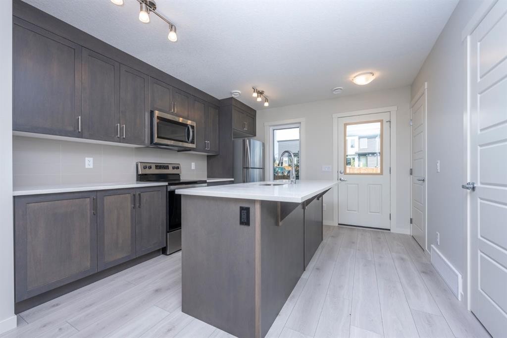 412 Seton Circle Se, Calgary, AB - Indoor Photo Showing Kitchen