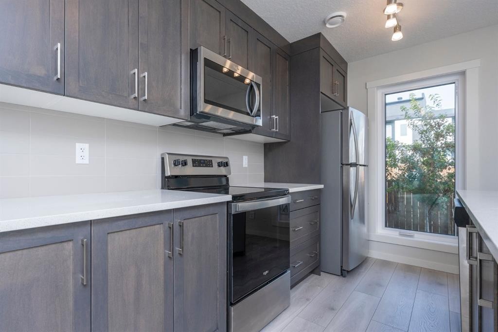 412 Seton Circle Se, Calgary, AB - Indoor Photo Showing Kitchen