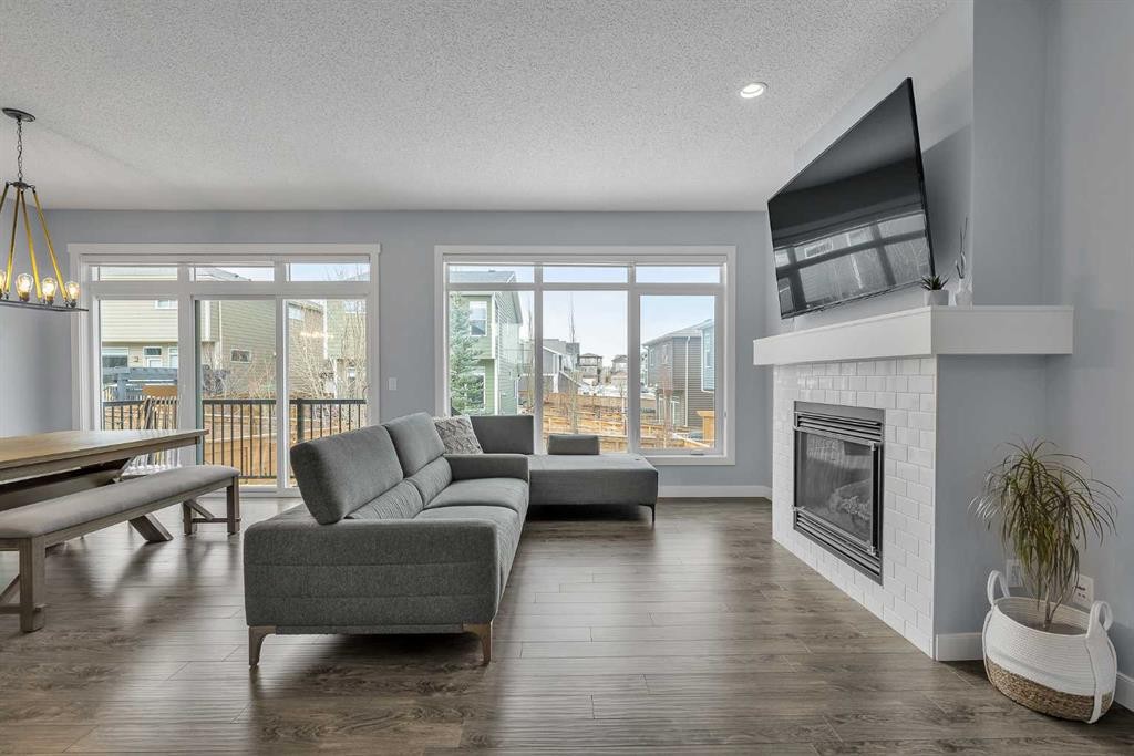 78 Sage Bluff View Nw, Calgary, AB - Indoor Photo Showing Living Room With Fireplace