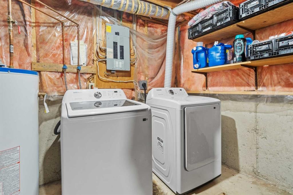 49 Range Gardens Nw, Calgary, AB - Indoor Photo Showing Laundry Room