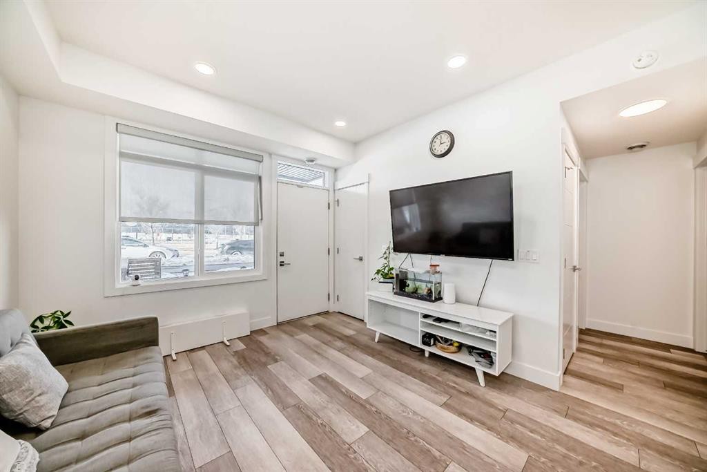 4697 Seton Drive Se, Calgary, AB - Indoor Photo Showing Living Room