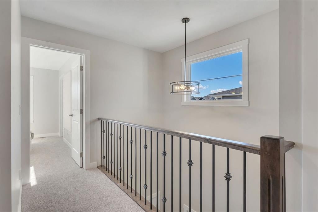 11 Fireside Common, Cochrane, AB - Indoor Photo Showing Other Room