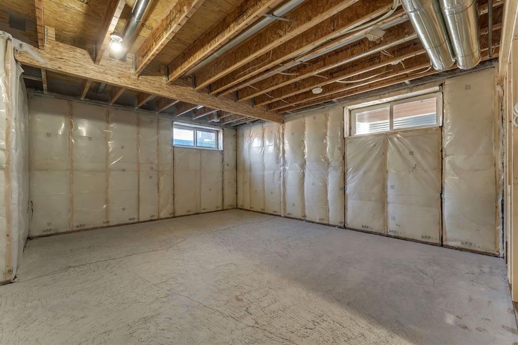 11 Fireside Common, Cochrane, AB - Indoor Photo Showing Basement