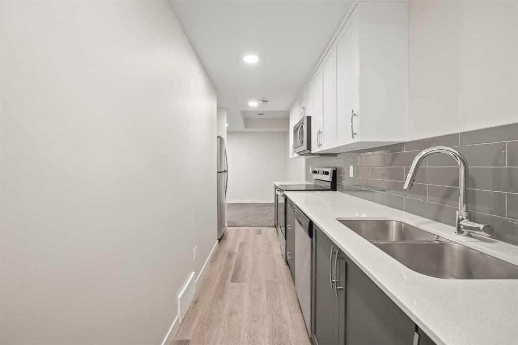 1224 Cornerstone Boulevard Ne, Calgary, AB - Indoor Photo Showing Kitchen With Double Sink