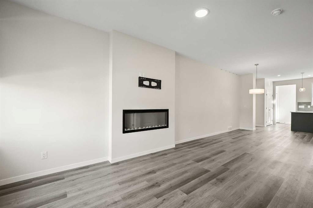 1224 Cornerstone Boulevard Ne, Calgary, AB - Indoor Photo Showing Living Room With Fireplace