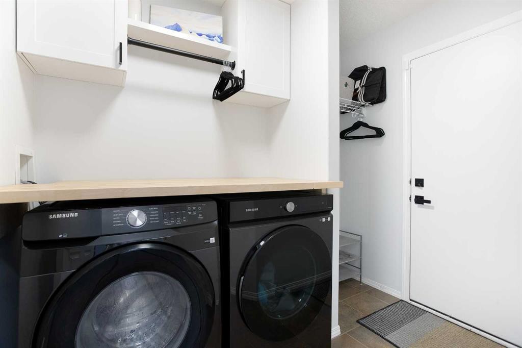 54 Springborough Point Sw, Calgary, AB - Indoor Photo Showing Laundry Room