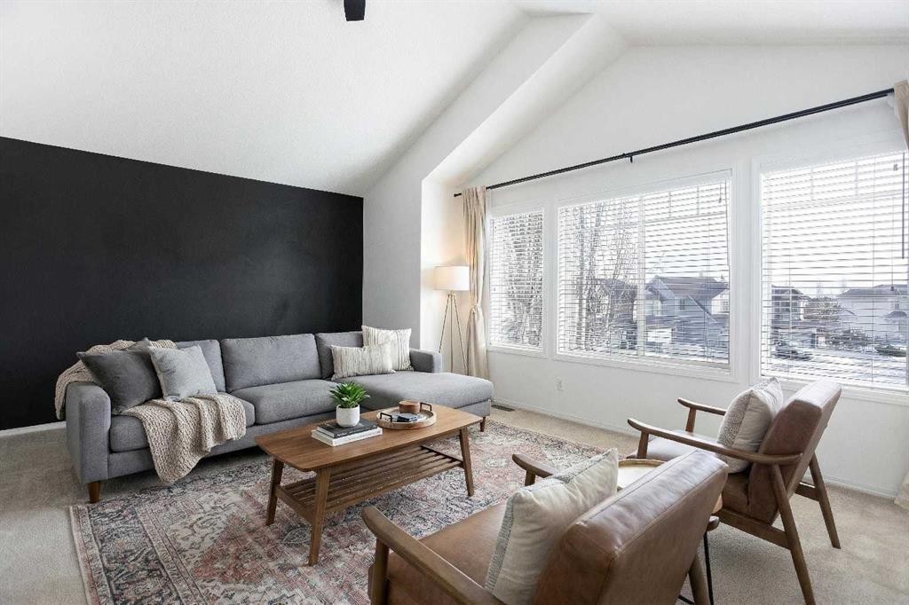54 Springborough Point Sw, Calgary, AB - Indoor Photo Showing Living Room