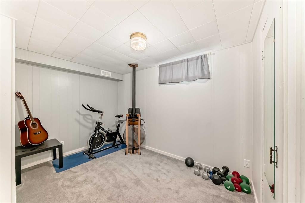 8043 Elbow Drive Sw, Calgary, AB - Indoor Photo Showing Gym Room