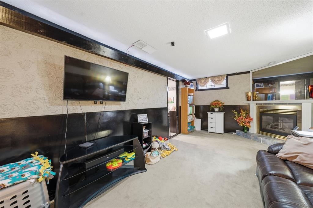 336 Whiteview Close Ne, Calgary, AB - Indoor With Fireplace