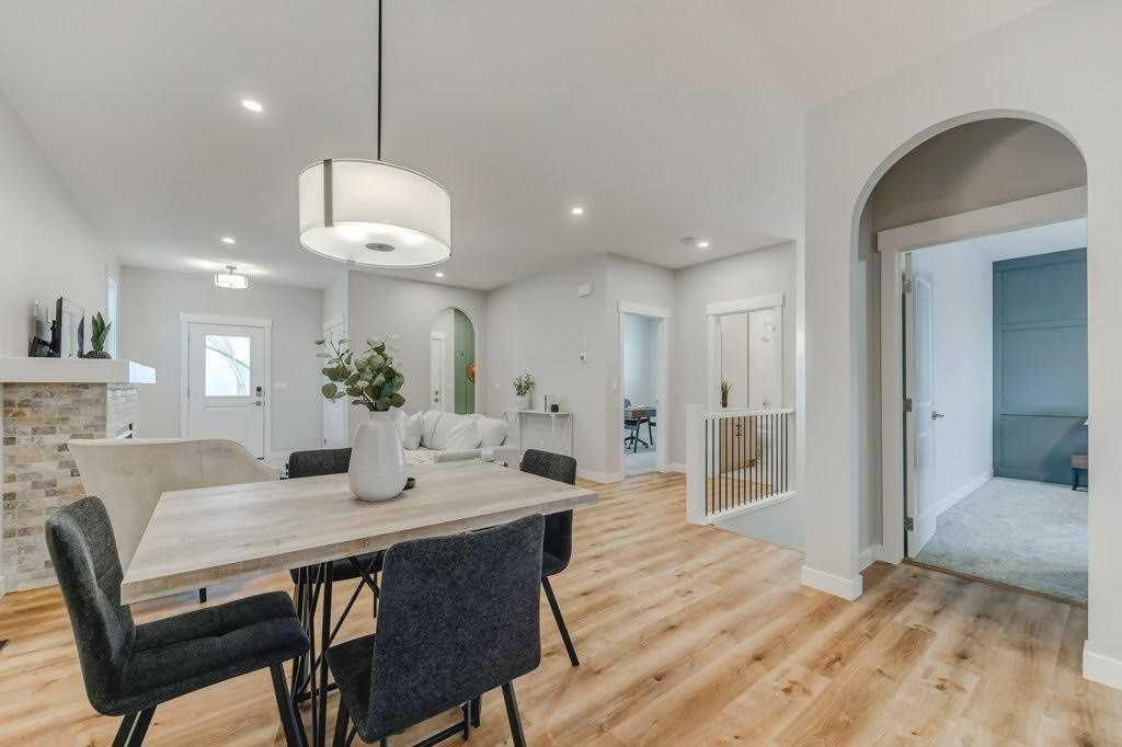 11 Clover Crescent, Beiseker, AB - Indoor Photo Showing Dining Room