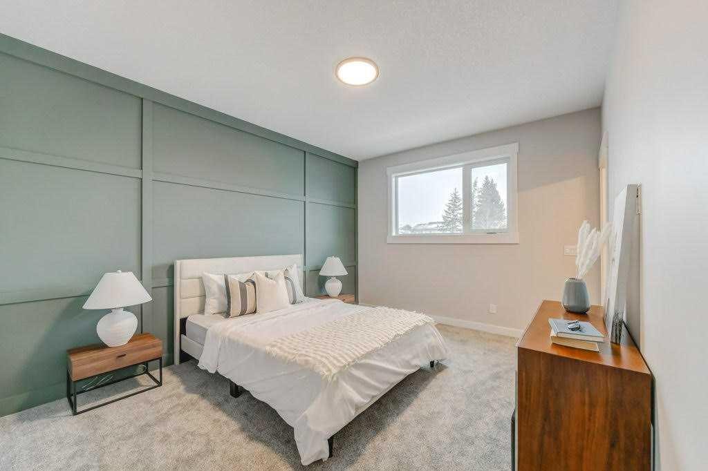 11 Clover Crescent, Beiseker, AB - Indoor Photo Showing Bedroom