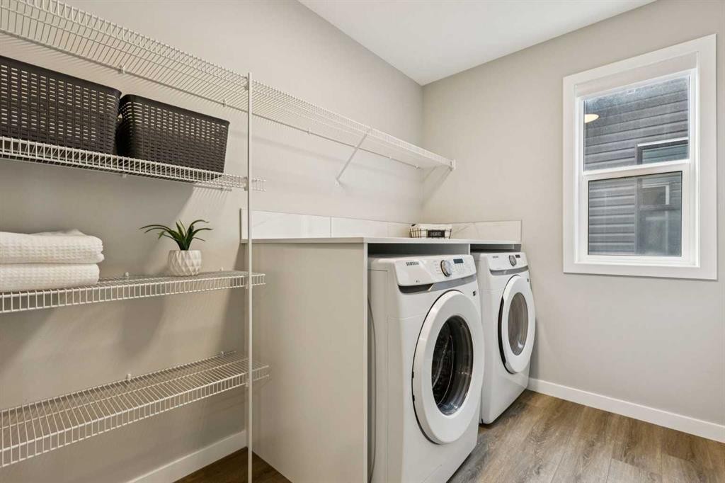 103 Saddlebred Link, Cochrane, AB - Indoor Photo Showing Laundry Room