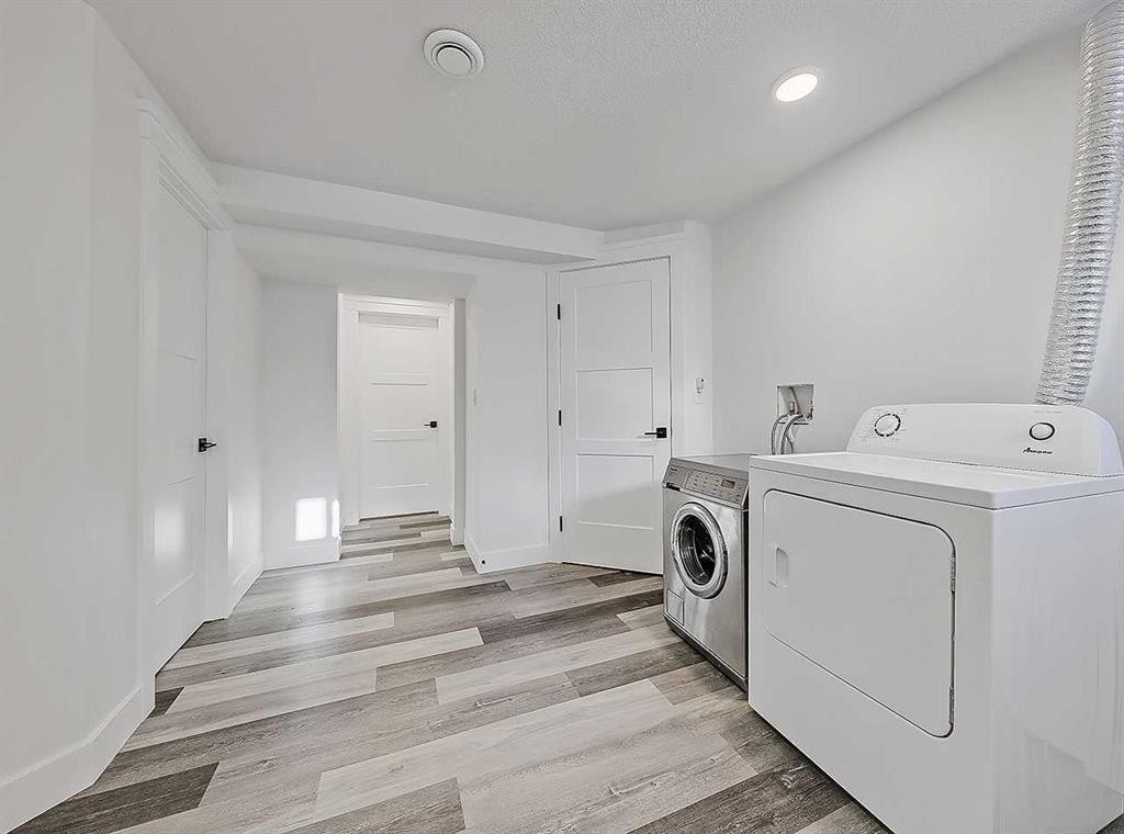 23 Cambrian Drive Nw, Calgary, AB - Indoor Photo Showing Laundry Room