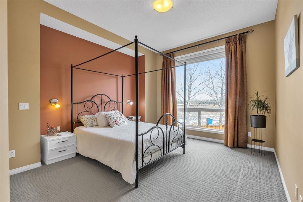 151 Hawkmere View, Chestermere, AB - Indoor Photo Showing Bedroom