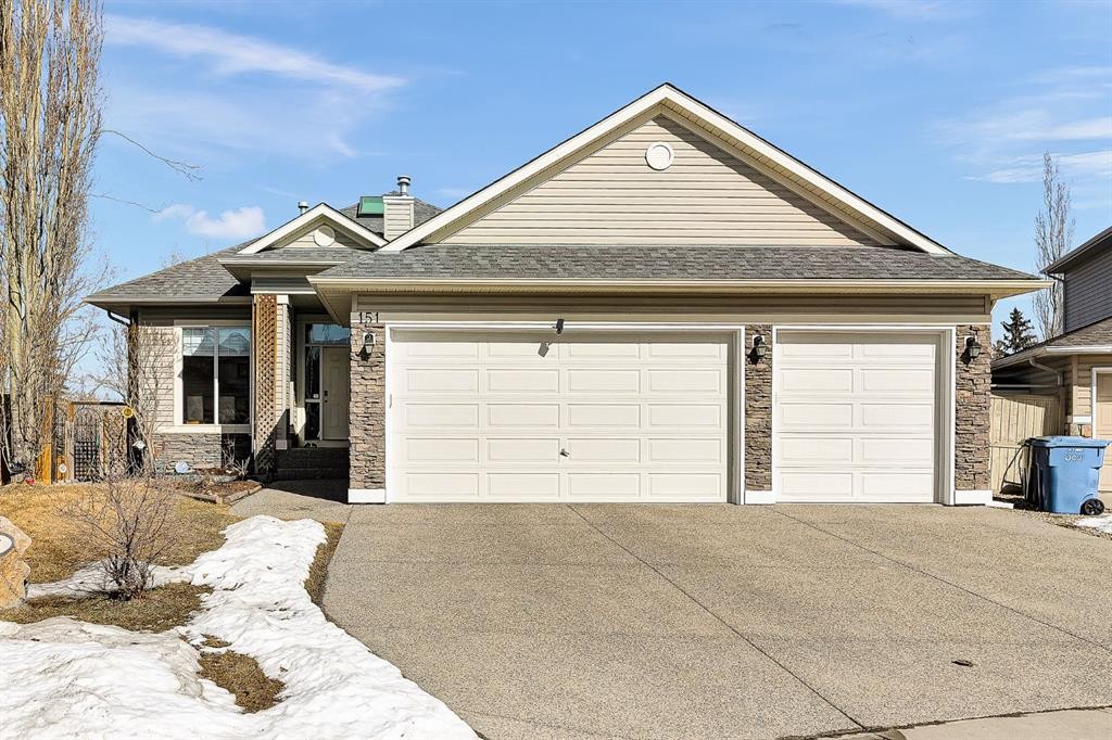 151 Hawkmere View, Chestermere, AB - Outdoor With Facade