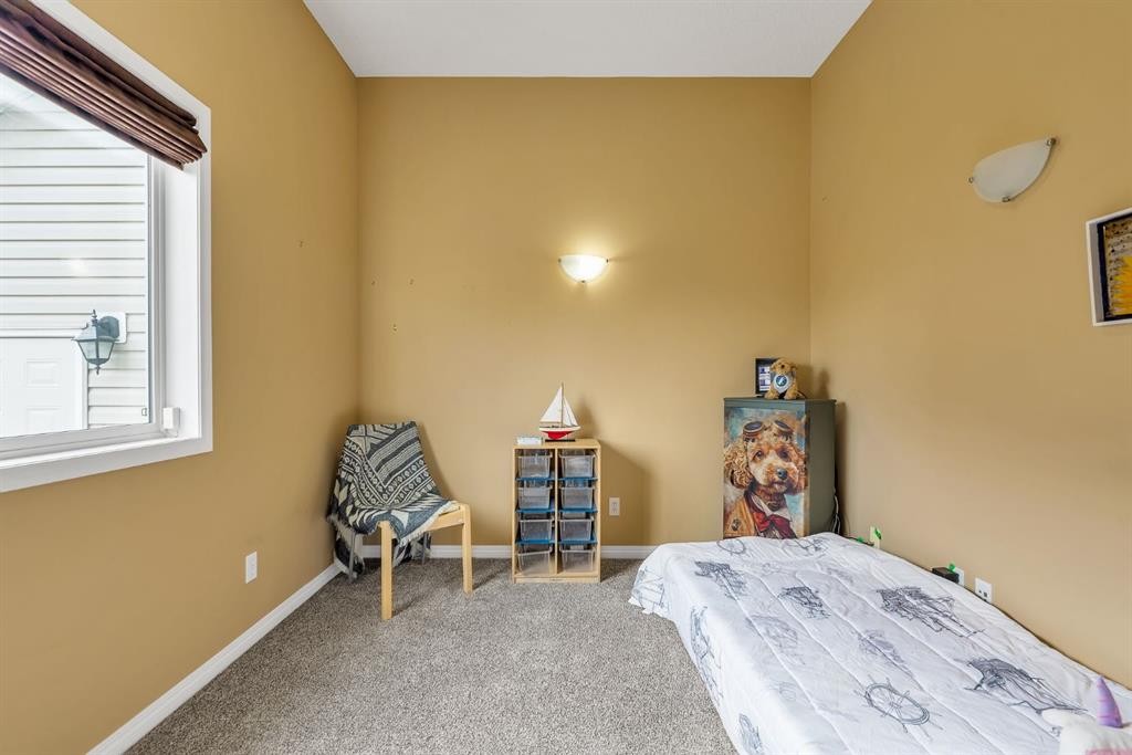 151 Hawkmere View, Chestermere, AB - Indoor Photo Showing Bedroom