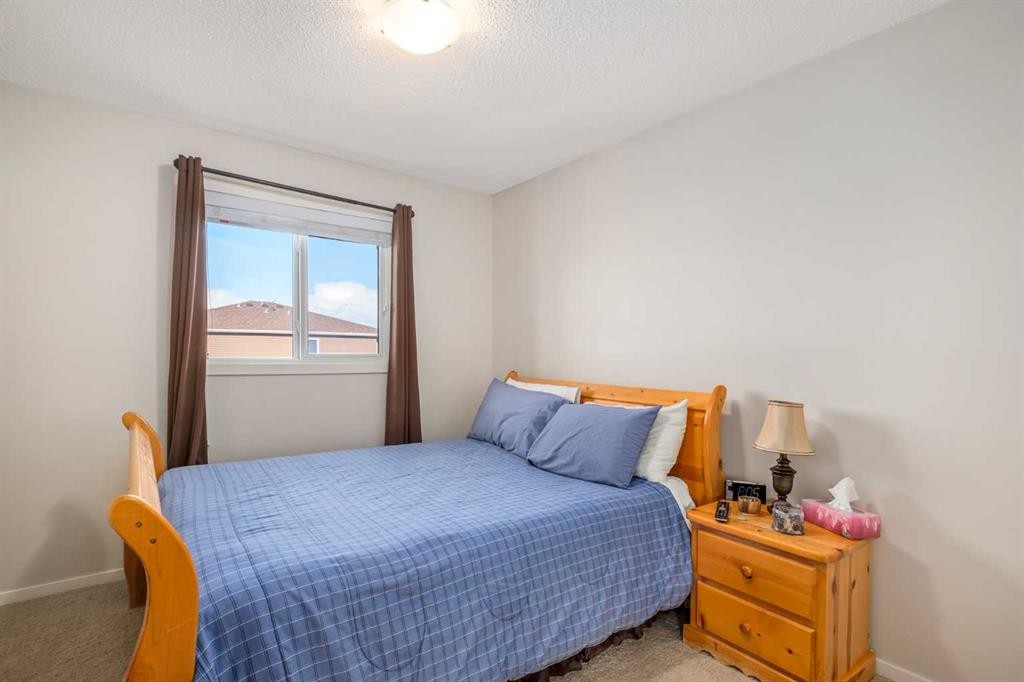 78 Livingston Gate Ne, Calgary, AB - Indoor Photo Showing Bedroom