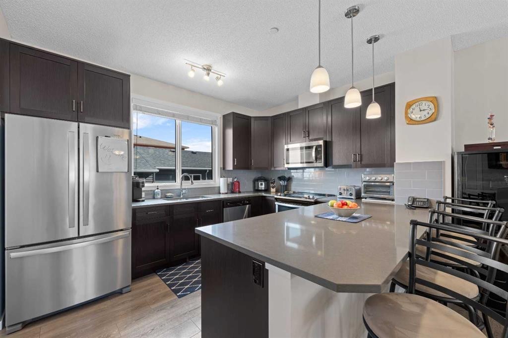 78 Livingston Gate Ne, Calgary, AB - Indoor Photo Showing Kitchen With Stainless Steel Kitchen With Upgraded Kitchen