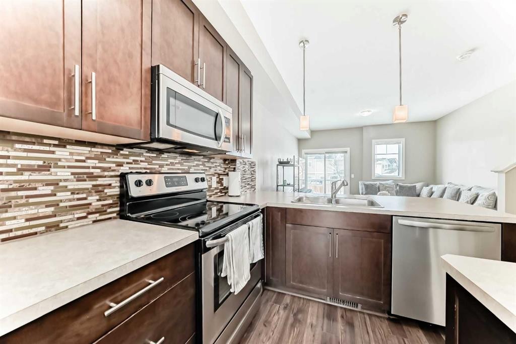 5 Redstone Circle Ne, Calgary, AB - Indoor Photo Showing Kitchen With Stainless Steel Kitchen With Double Sink With Upgraded Kitchen