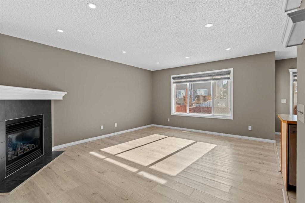138 Saddlecrest Park Ne, Calgary, AB - Indoor With Fireplace