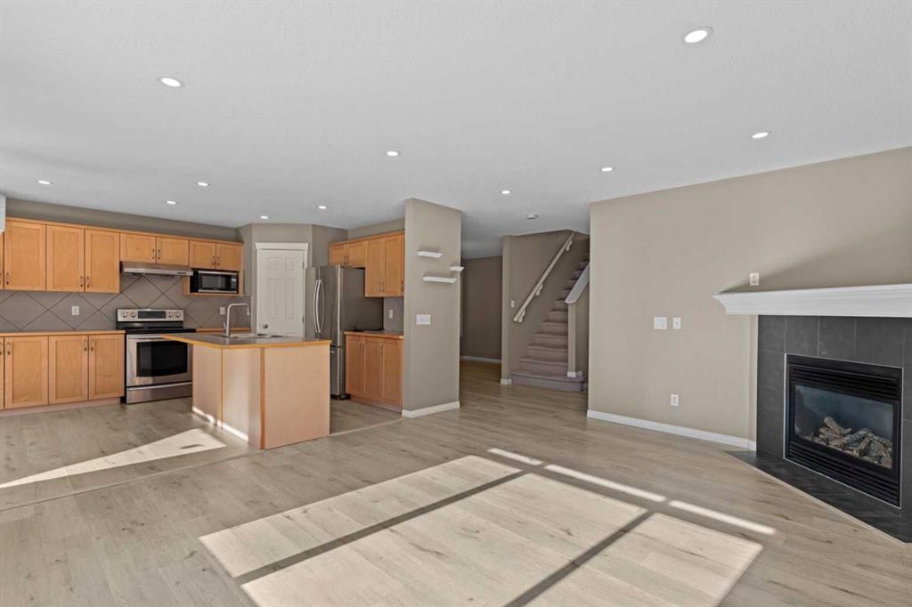 138 Saddlecrest Park Ne, Calgary, AB - Indoor With Fireplace