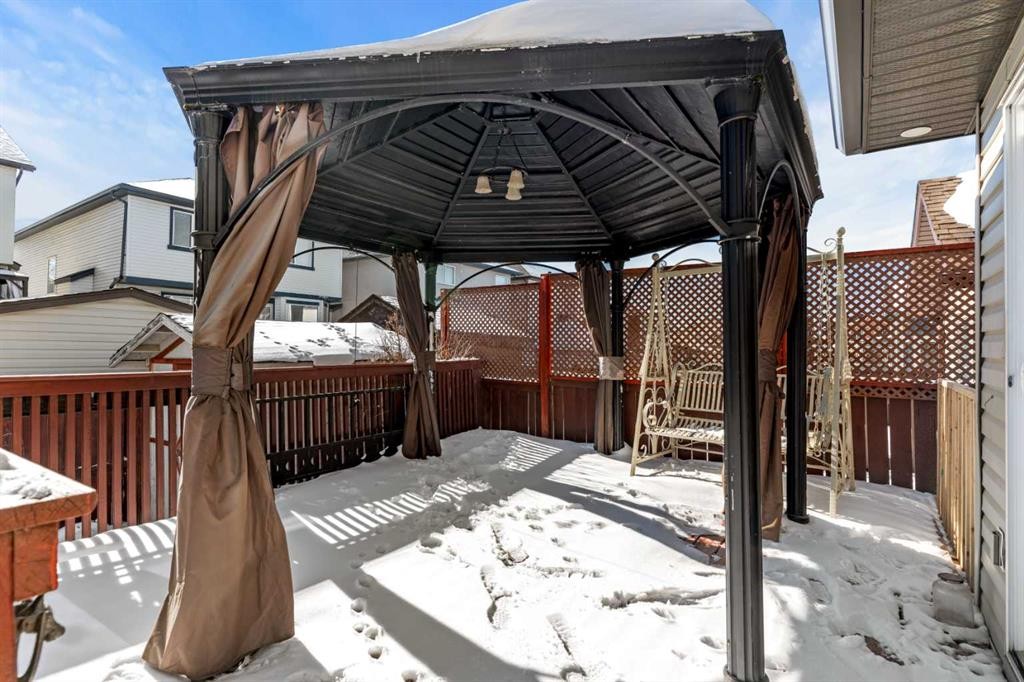 138 Saddlecrest Park Ne, Calgary, AB - Outdoor With Deck Patio Veranda With Exterior