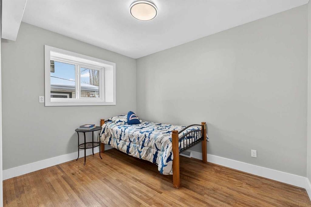 64 Foxwell Road Se, Calgary, AB - Indoor Photo Showing Bedroom