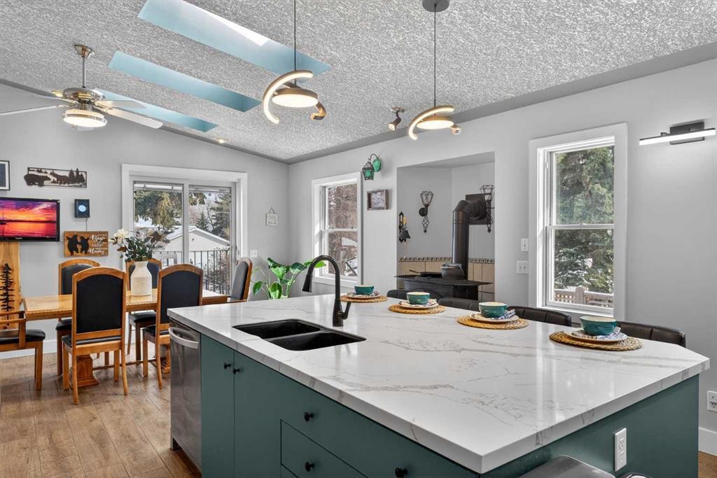 64 Foxwell Road Se, Calgary, AB - Indoor Photo Showing Kitchen With Double Sink