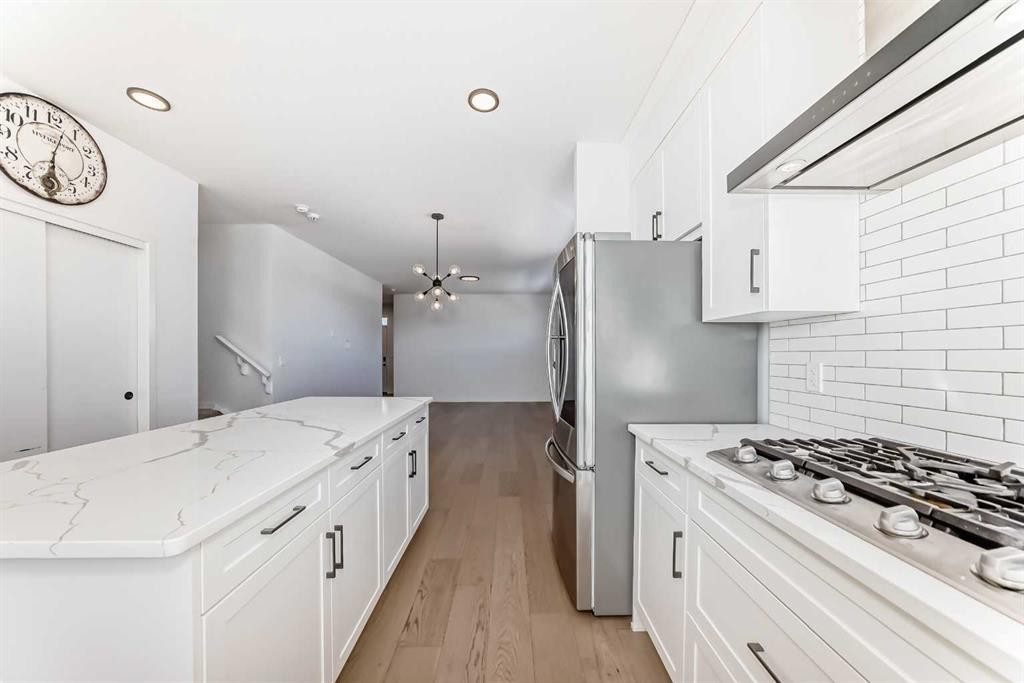 120 Seton Villas Se, Calgary, AB - Indoor Photo Showing Kitchen With Stainless Steel Kitchen With Upgraded Kitchen