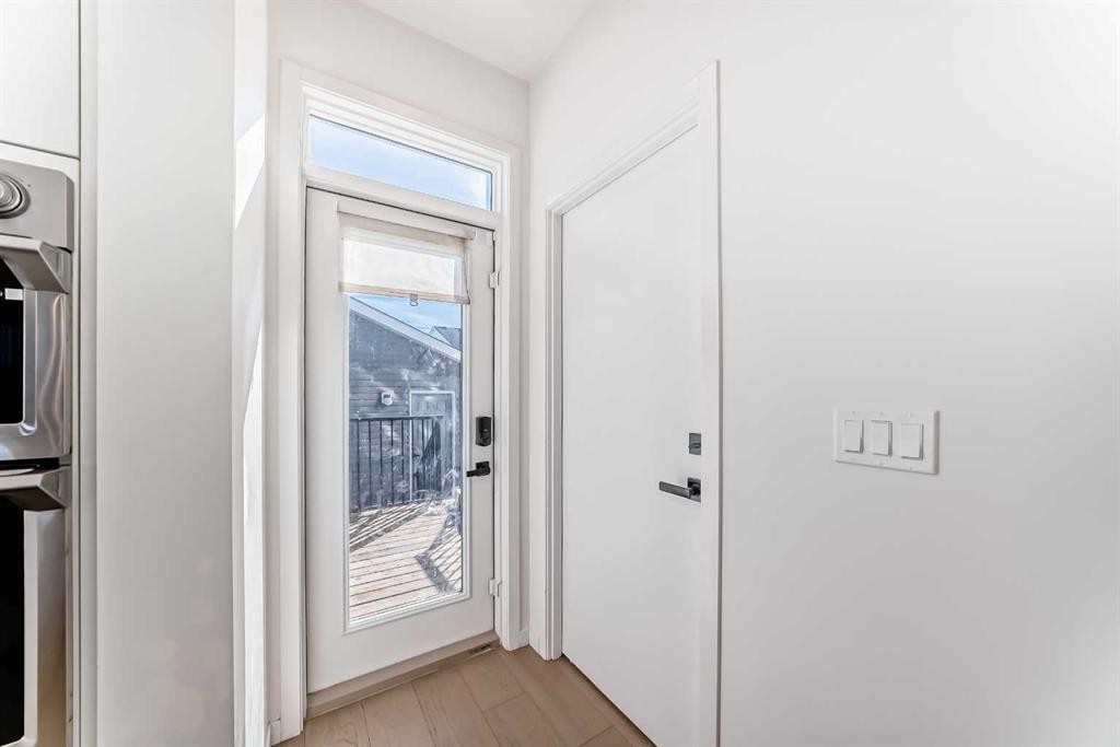 120 Seton Villas Se, Calgary, AB - Indoor Photo Showing Other Room