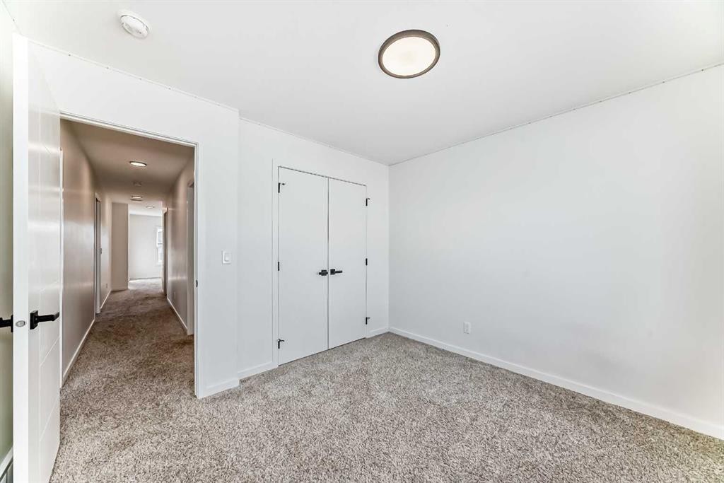120 Seton Villas Se, Calgary, AB - Indoor Photo Showing Other Room
