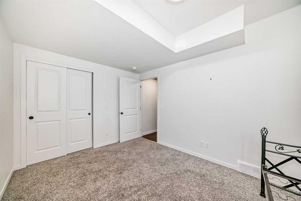 120 Seton Villas Se, Calgary, AB - Indoor Photo Showing Other Room