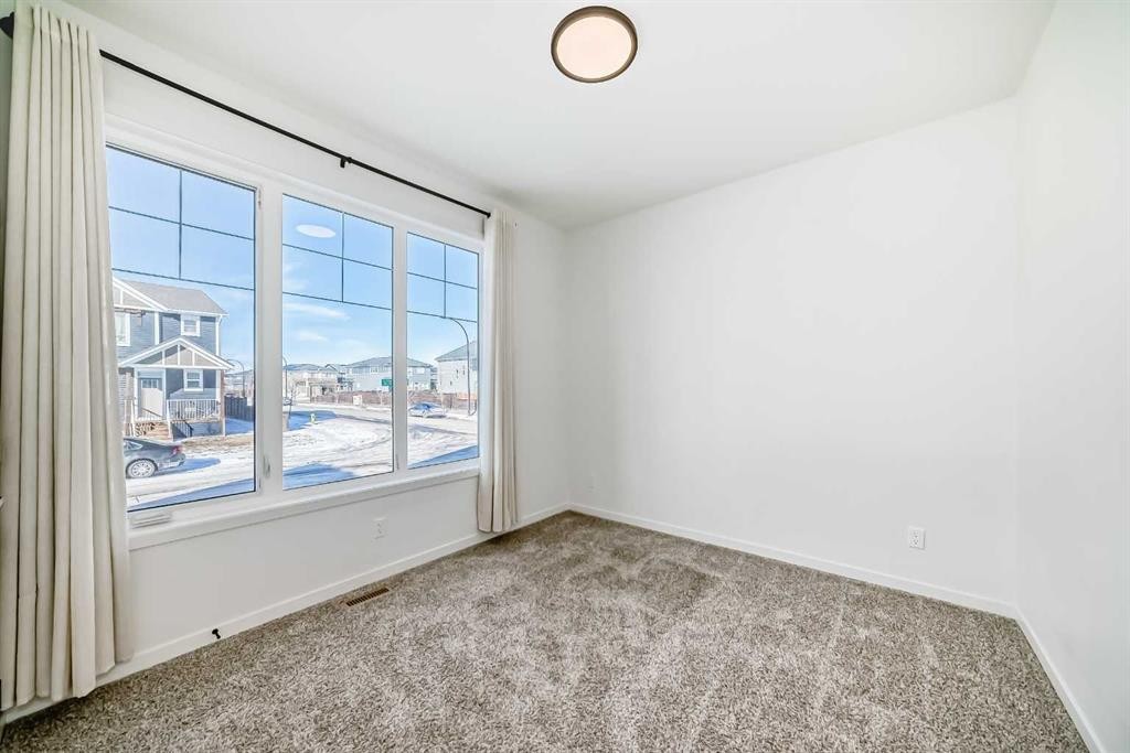 120 Seton Villas Se, Calgary, AB - Indoor Photo Showing Other Room