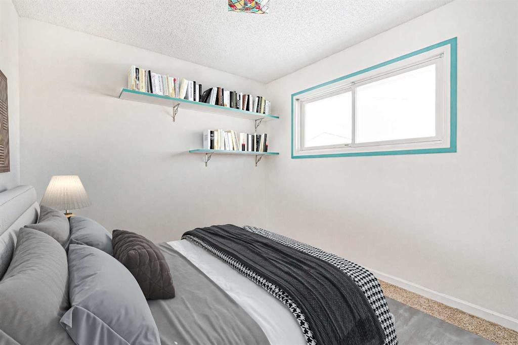 55 Queen Isabella Close Se, Calgary, AB - Indoor Photo Showing Bedroom