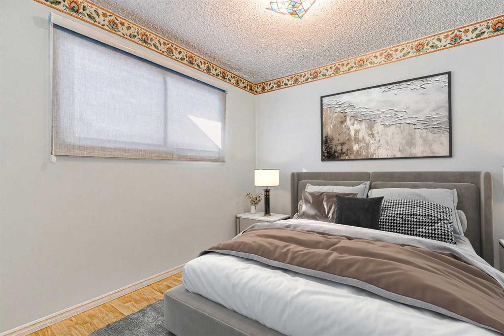55 Queen Isabella Close Se, Calgary, AB - Indoor Photo Showing Bedroom