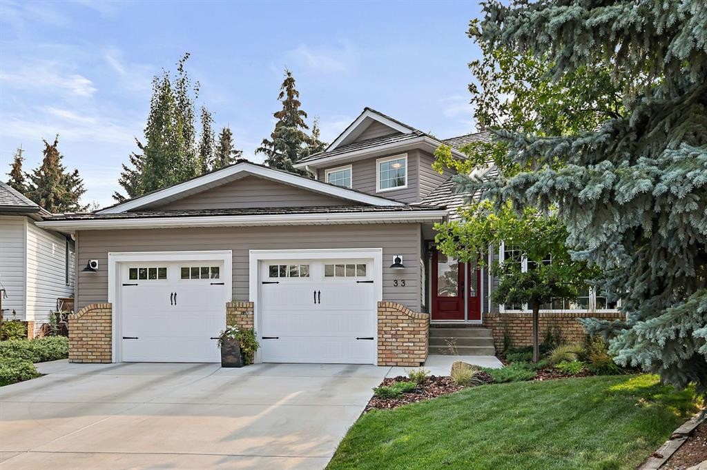 33 Sunset Crescent, Okotoks, AB - Outdoor With Facade
