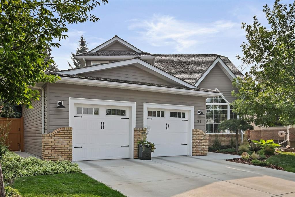 33 Sunset Crescent, Okotoks, AB - Outdoor With Facade