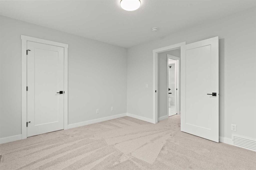 467 Kinniburgh Loop, Chestermere, AB - Indoor Photo Showing Other Room