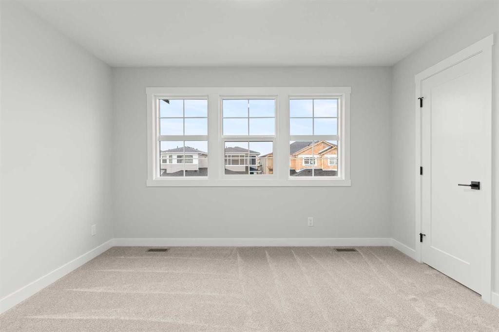 467 Kinniburgh Loop, Chestermere, AB - Indoor Photo Showing Other Room