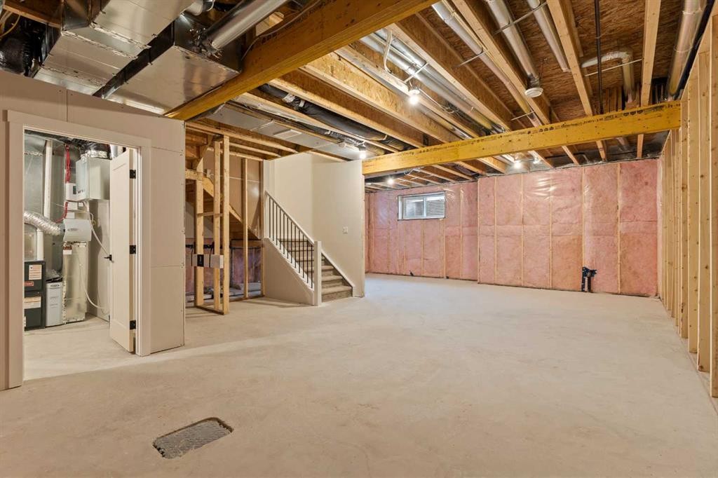 467 Kinniburgh Loop, Chestermere, AB - Indoor Photo Showing Basement