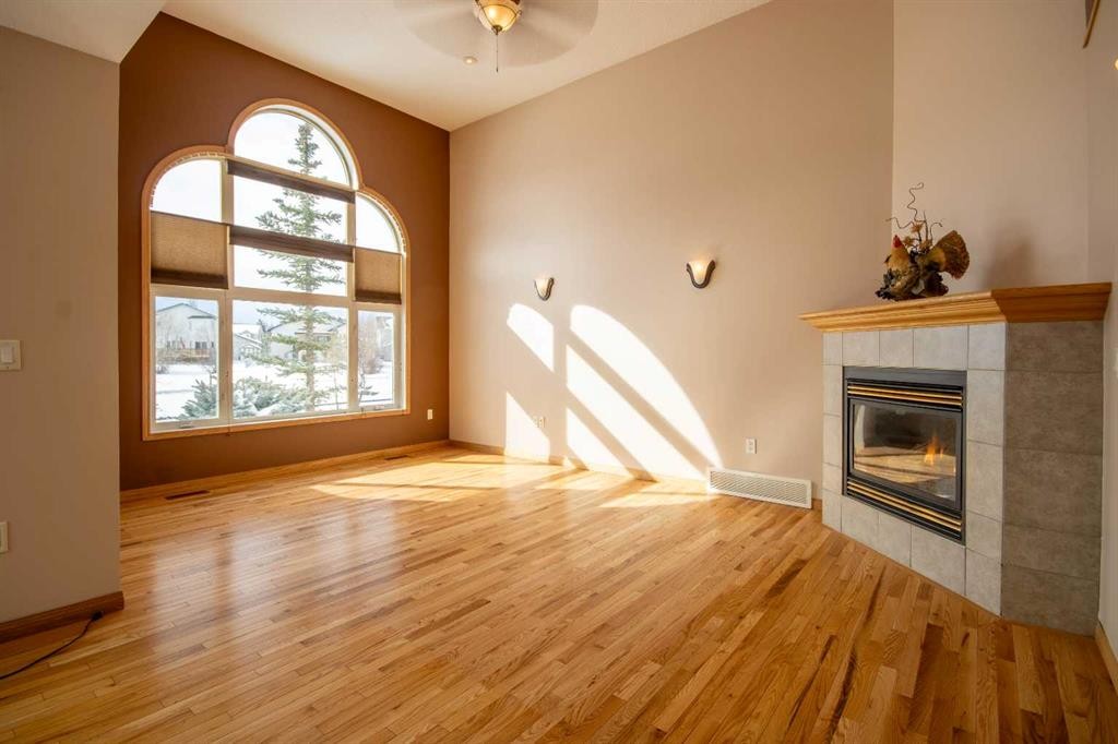 5111 Shannon Drive, Olds, AB - Indoor Photo Showing Other Room With Fireplace