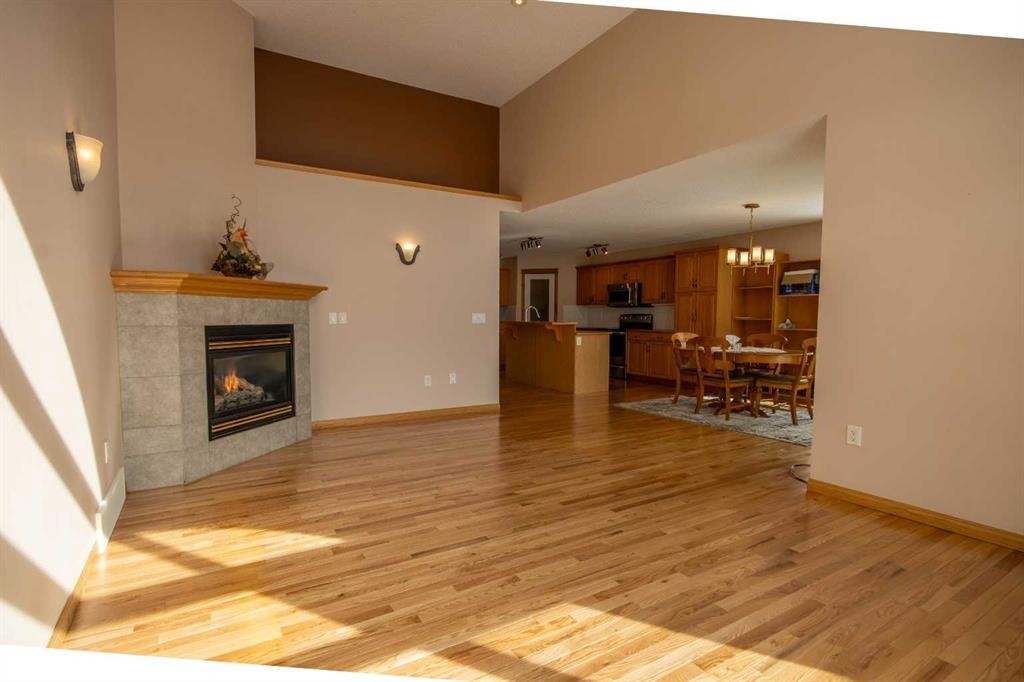 5111 Shannon Drive, Olds, AB - Indoor Photo Showing Living Room With Fireplace