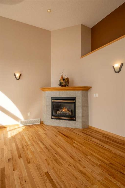 5111 Shannon Drive, Olds, AB - Indoor Photo Showing Living Room With Fireplace