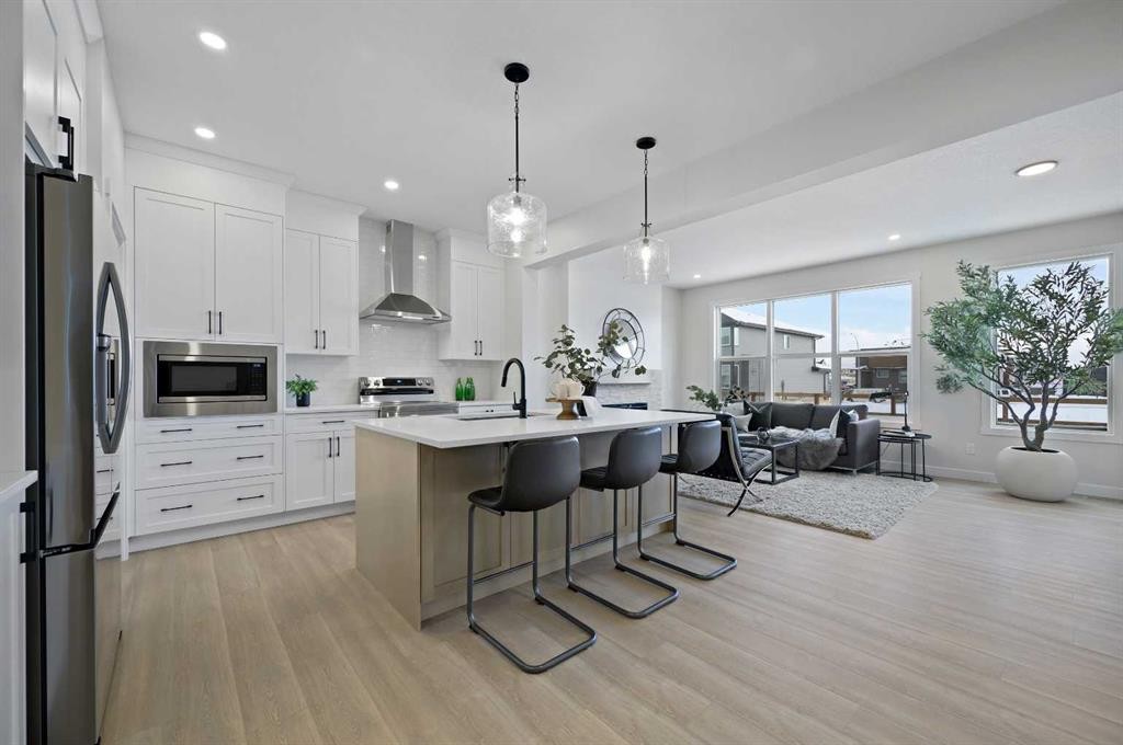 15 Fireside Common, Cochrane, AB - Indoor Photo Showing Kitchen With Stainless Steel Kitchen With Upgraded Kitchen