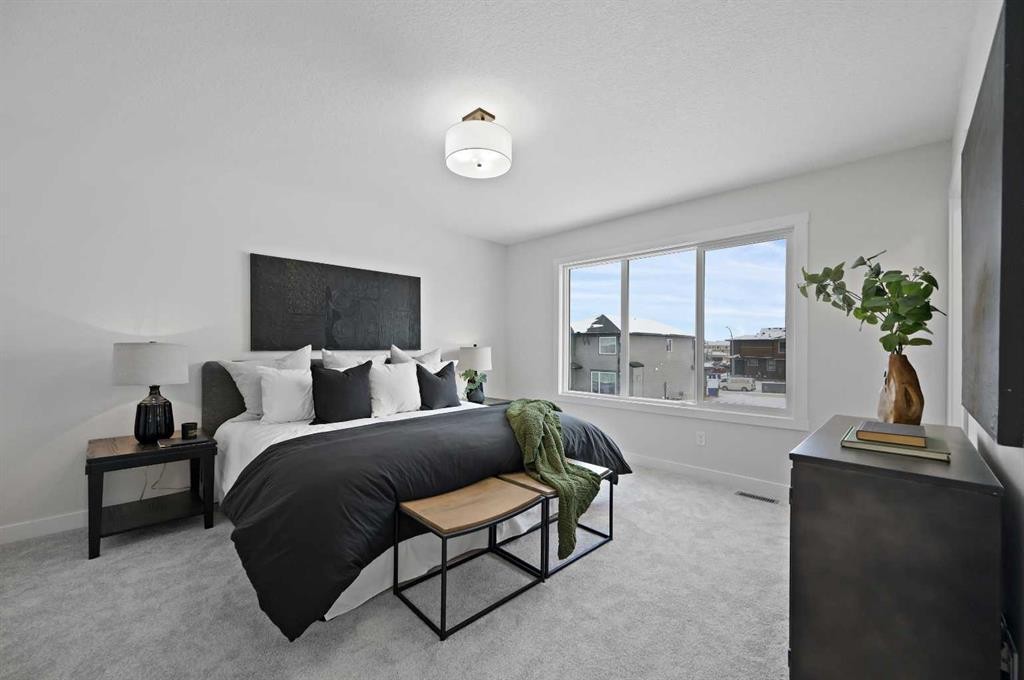 15 Fireside Common, Cochrane, AB - Indoor Photo Showing Bedroom
