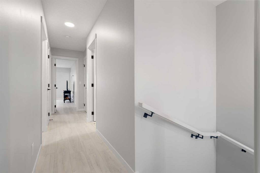 22 Edith Manor Nw, Calgary, AB - Indoor Photo Showing Other Room