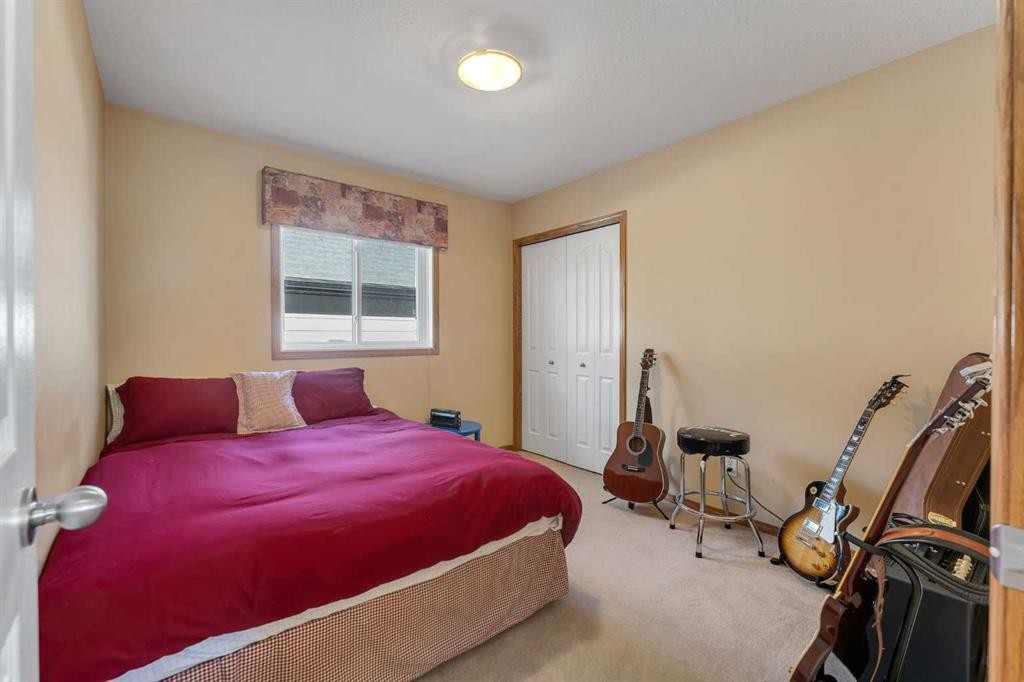 214 Saddlemont Boulevard Ne, Calgary, AB - Indoor Photo Showing Bedroom