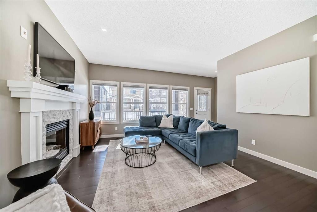 90 Evanspark Road Nw, Calgary, AB - Indoor Photo Showing Living Room With Fireplace