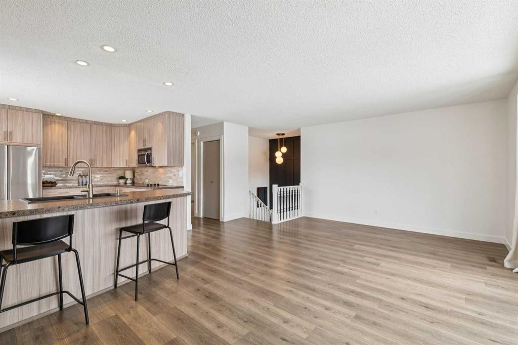 11016 Braton Place Sw, Calgary, AB - Indoor Photo Showing Kitchen With Stainless Steel Kitchen With Upgraded Kitchen