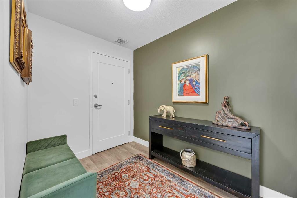 210-38 Quarry Gate Se, Calgary, AB - Indoor Photo Showing Other Room